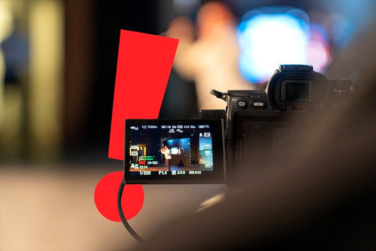 Idea Media cinema camera recording a live event, with the brand's red exclamation mark in the frame
